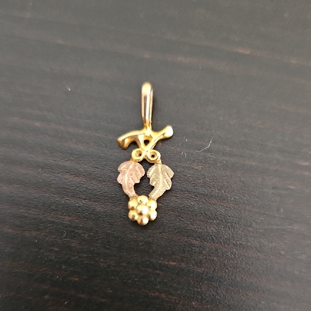 Elegant Gold and Silver Leaf Pendant